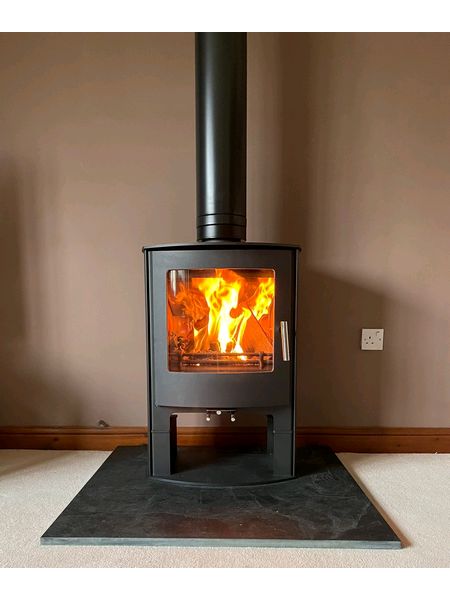 riven slate hearth with a mendip churchill logstore
