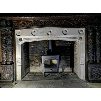 Clearview Vision 500 8kw stove fitted in this beautiful historic hall in Norfolk